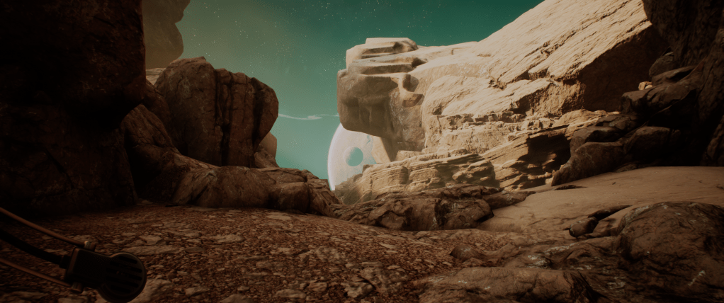 A rocky ravine reveals a planet or moon peeking at the end. Yasna's space suit's microphone is ever present on the bottom left.